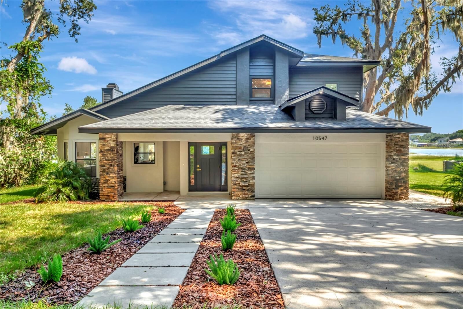 Property Photo: 10547 Lakeshore Drive FL 34711