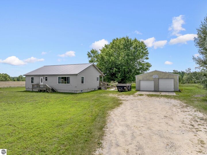 Property Photo:  6268 E M-72  MI 49646 