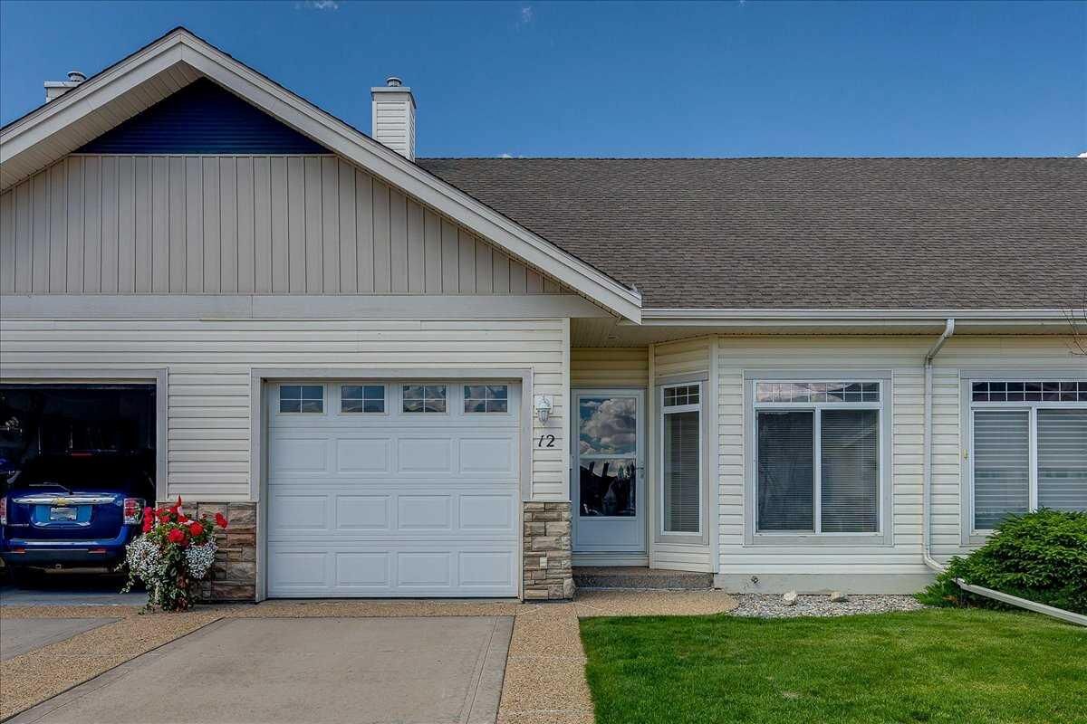 Property Photo: 939 Ramage Crescent 12 AB T4P 3Z9