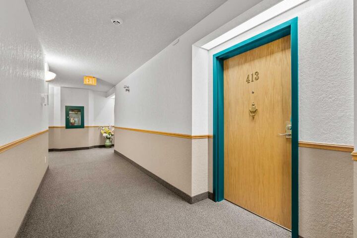 Property Photo:  7239 Sierra Morena Boulevard SW 413  AB T3H 3L7 
