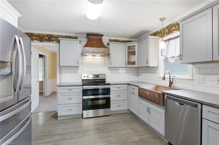 Property Photo:  1744 Huntington Woods Court  NC 27103 