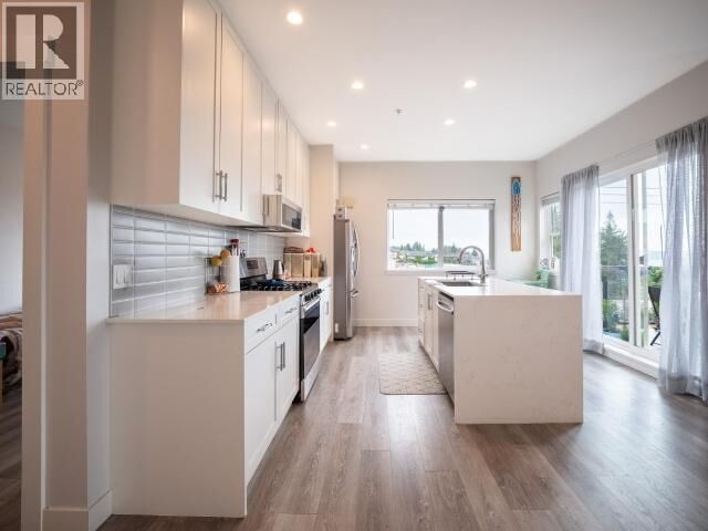 Property Photo: 401-7175 Duncan Street BC V8A 1W3