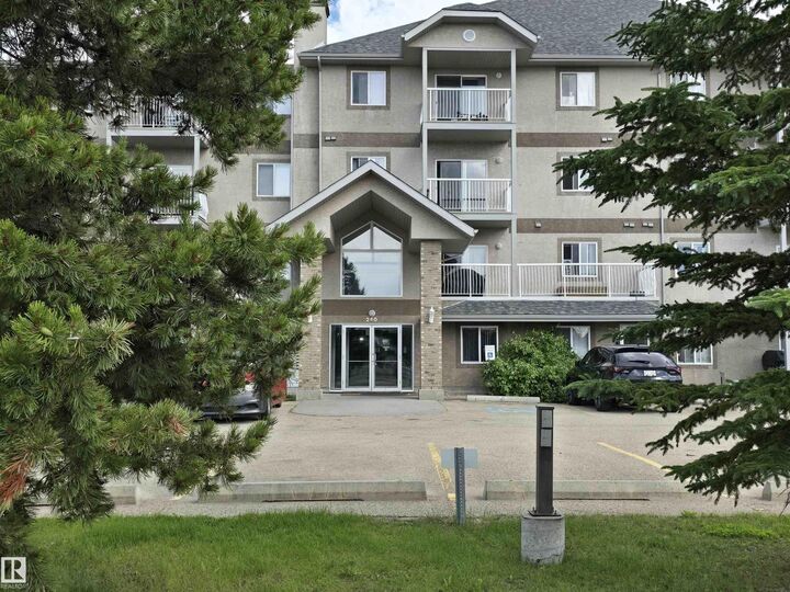 Property Photo: 240 Spruce Ridge Road 204 AB T7X 0G5