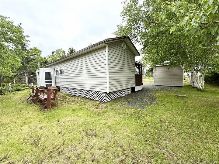 Property Photo:  106 Allée Des Vacanciers  NB E8T 5S1 