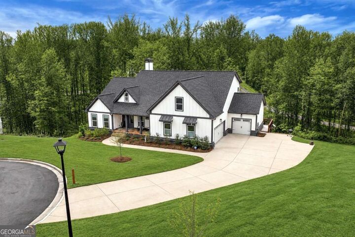Property Photo: 6140 Crescent Moon Ridge GA 30041