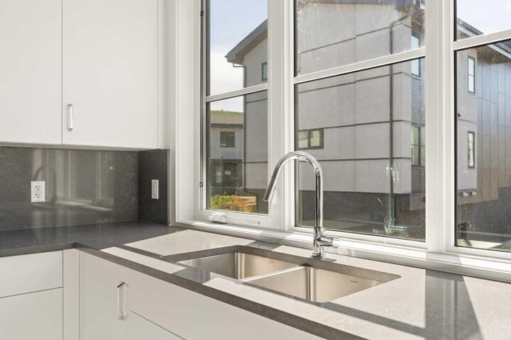Property Photo: 1453 Naa Drive SW 401 AB T3H 6H7