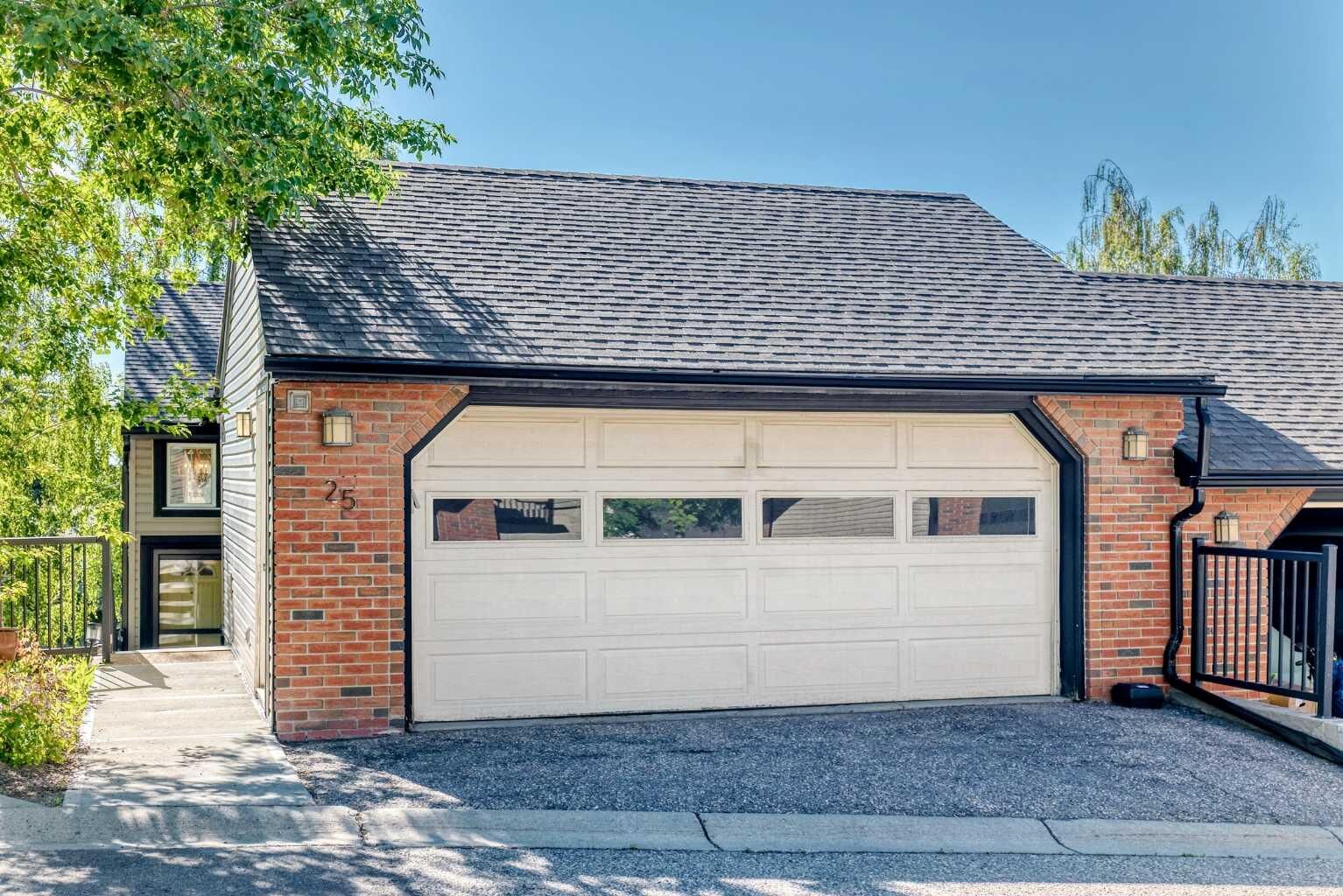 Property Photo: 448 Strathcona Drive SW 25 AB T3H 1M3