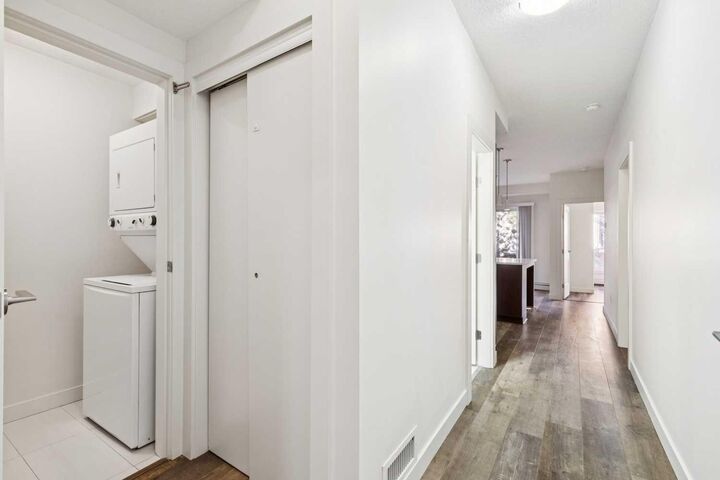 Property Photo: 15233 1 Street SE 108 AB T2X 0X5