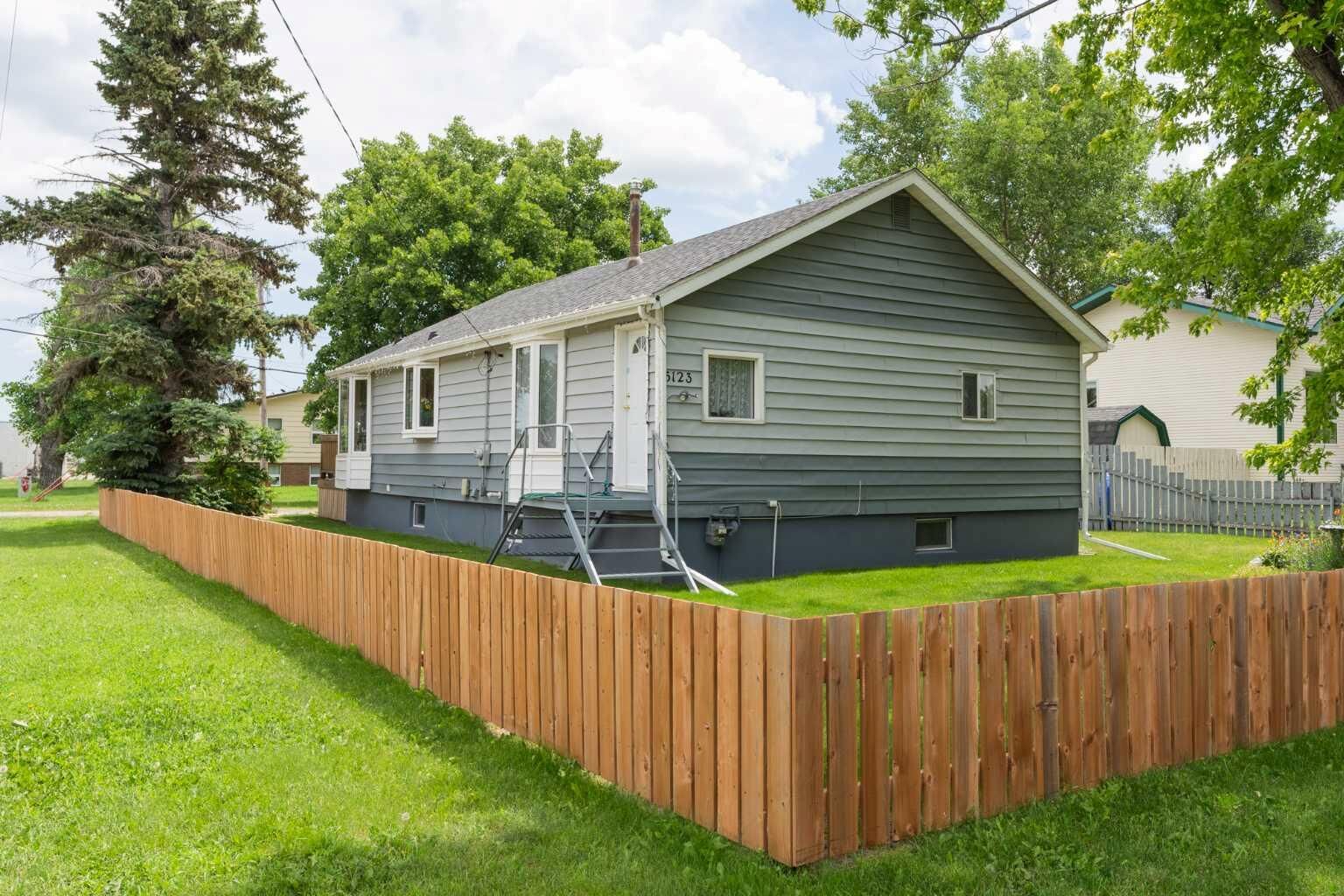 Property Photo:  5123 56 Street  AB T1G 1M8 