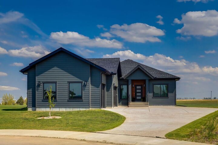Property Photo: 232 Red Tail Ridge SE AB T1V 0J8