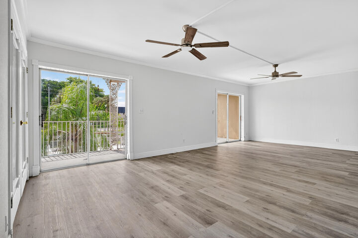 Property Photo:  495 SE 8th Street 242  FL 33441 
