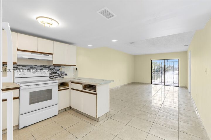Property Photo:  5580 W 26th Ct 102  FL 33016 