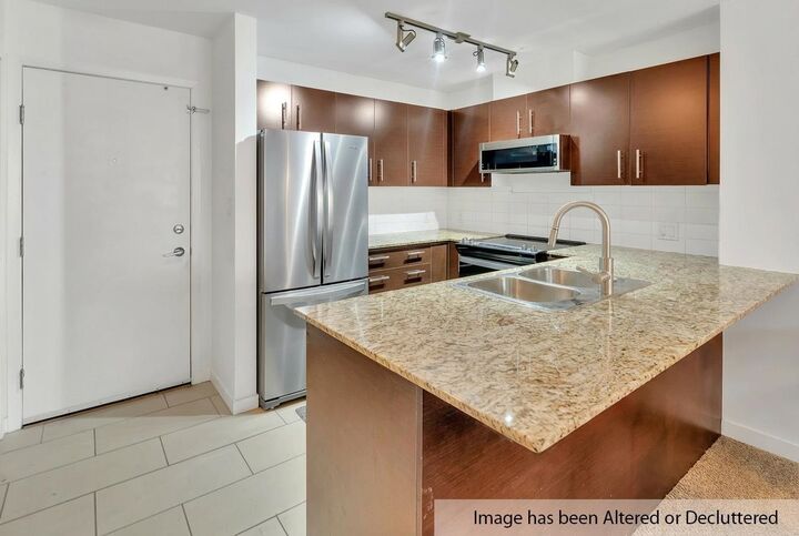 Property Photo: 11665 Haney Bypass 309 BC V2X 8W9