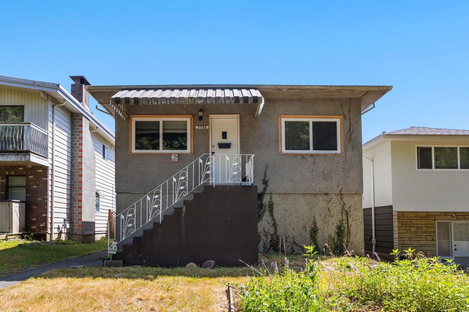 Property Photo: 3186 E 28th Avenue BC V5R 1S7