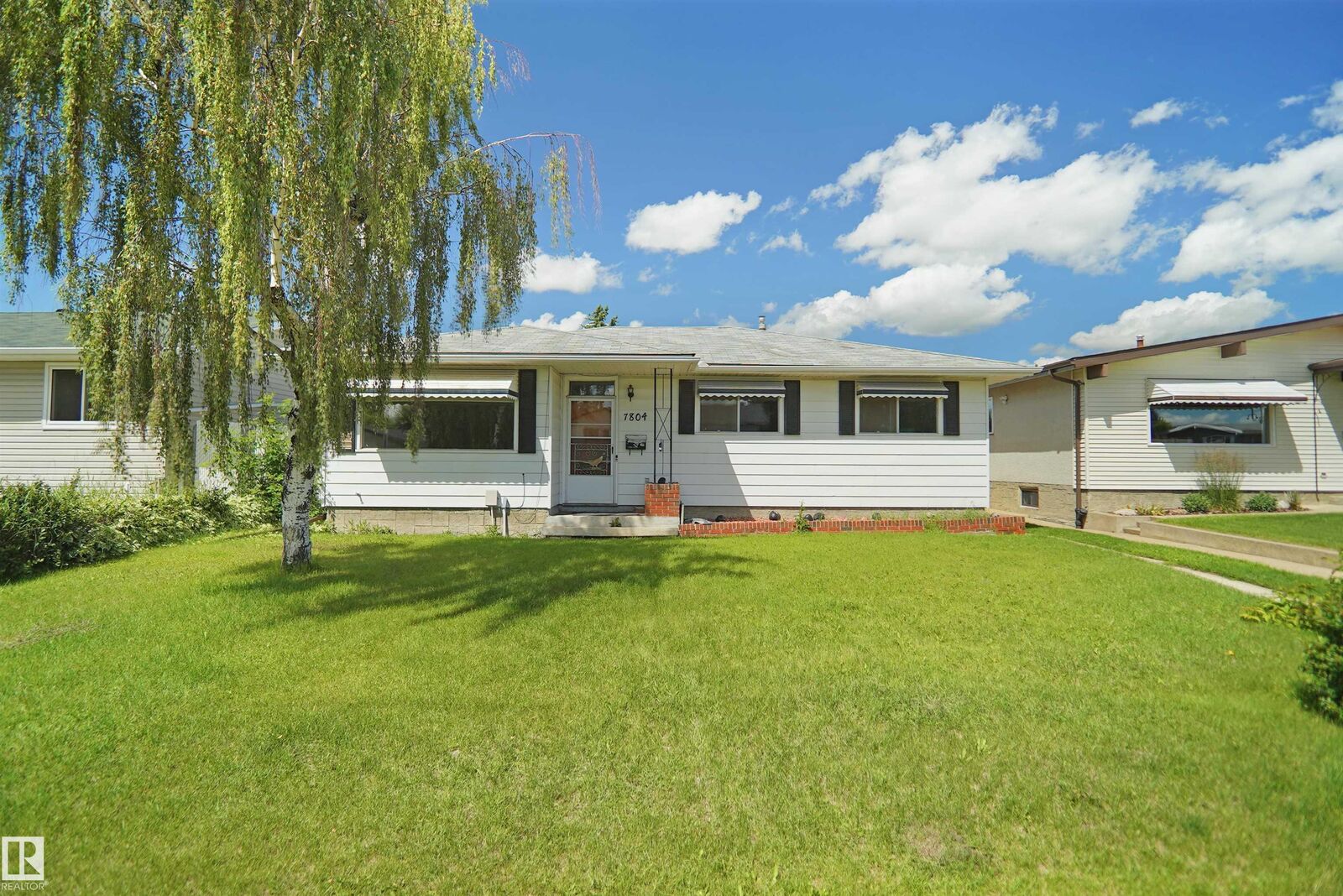 Property Photo:  7804 143 Avenue NW  AB T5C 2R1 