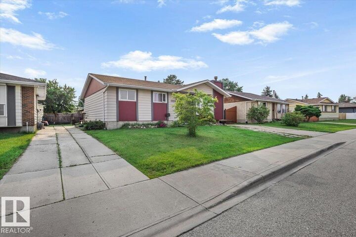 Property Photo: 13224 37 Street NW AB T5A 3G2