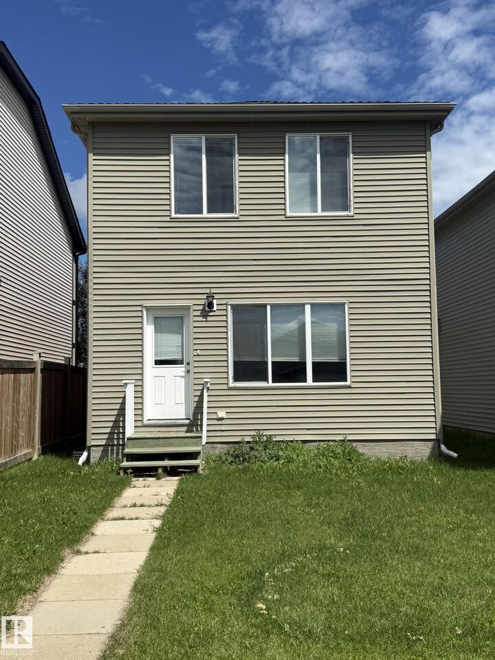 Property Photo:  8305 Ellis Crescent NW  AB T6M 2N5 