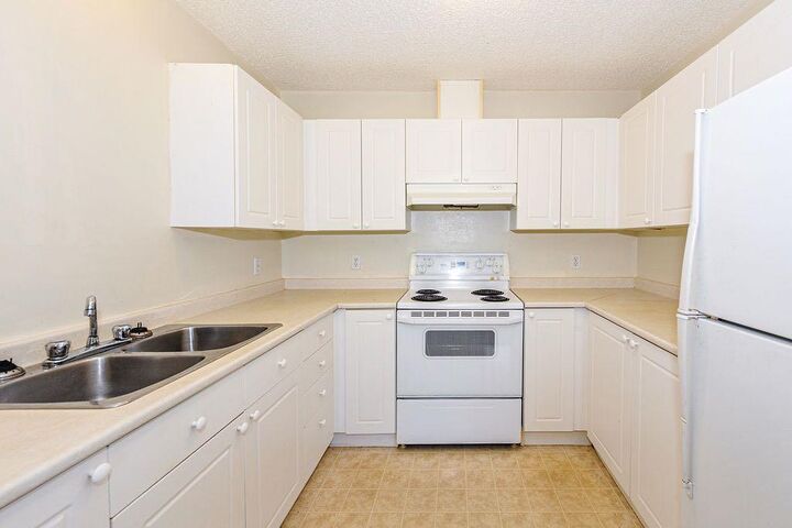 Property Photo:  4919 68 Street 106C  AB T4V 4T9 