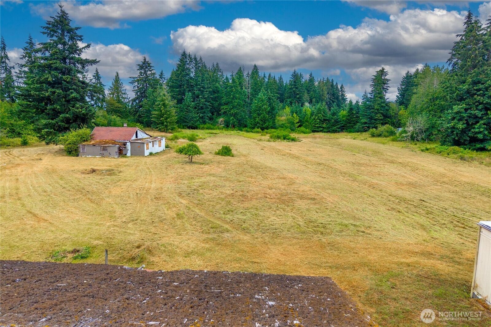 Property Photo:  18707  Rhodes Lake Road E  WA 98391 