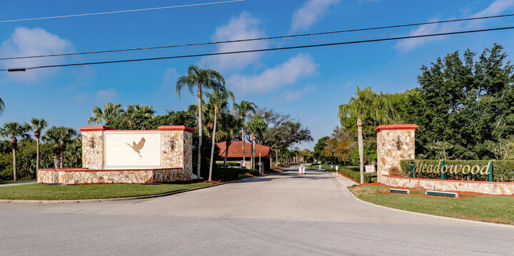 Property Photo: 9460 Meadowood Drive 104 FL 34951