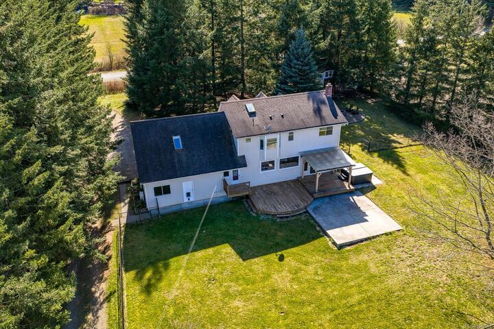 Property Photo:  6104 Ledingham Rd  BC V9J 1M9 
