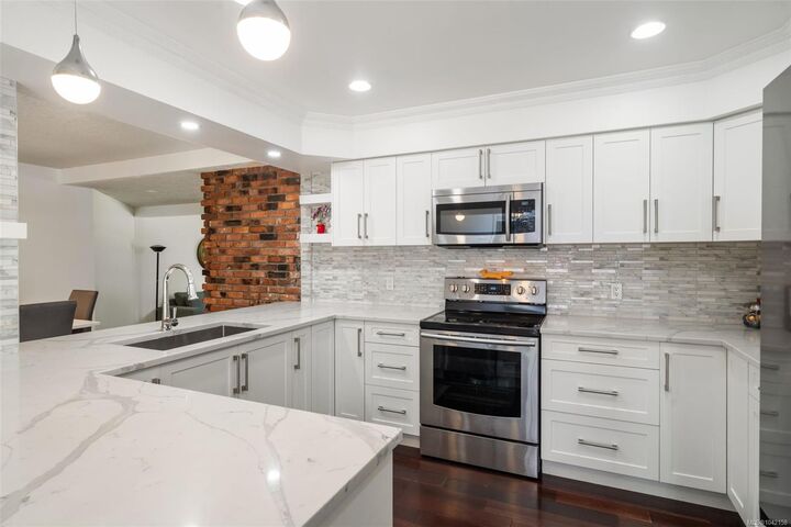 Property Photo: 4682 Lochside Dr BC V8Y 2X7