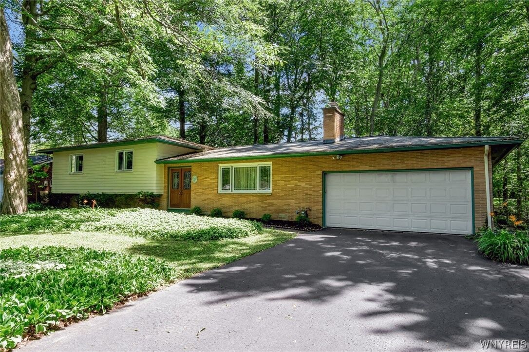 Property Photo:  303 Hilltop Drive  NY 14059 