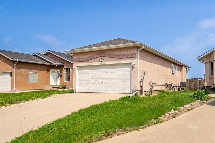 Property Photo: 79 Paul Martin Drive MB R2C 5M4