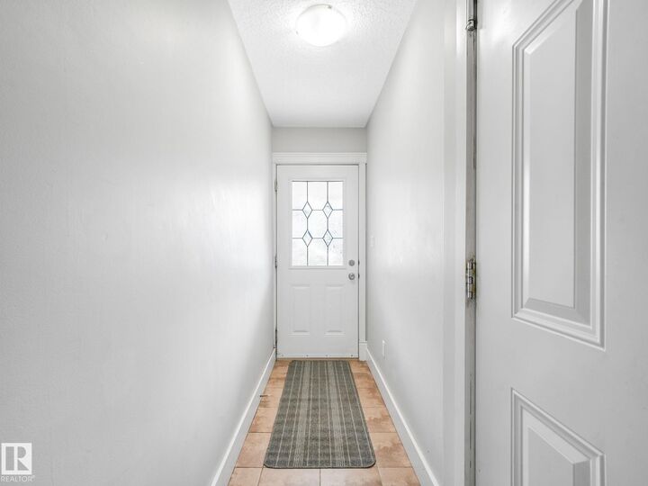 Property Photo: 13215 153 Avenue NW 5 AB T6V 0B6