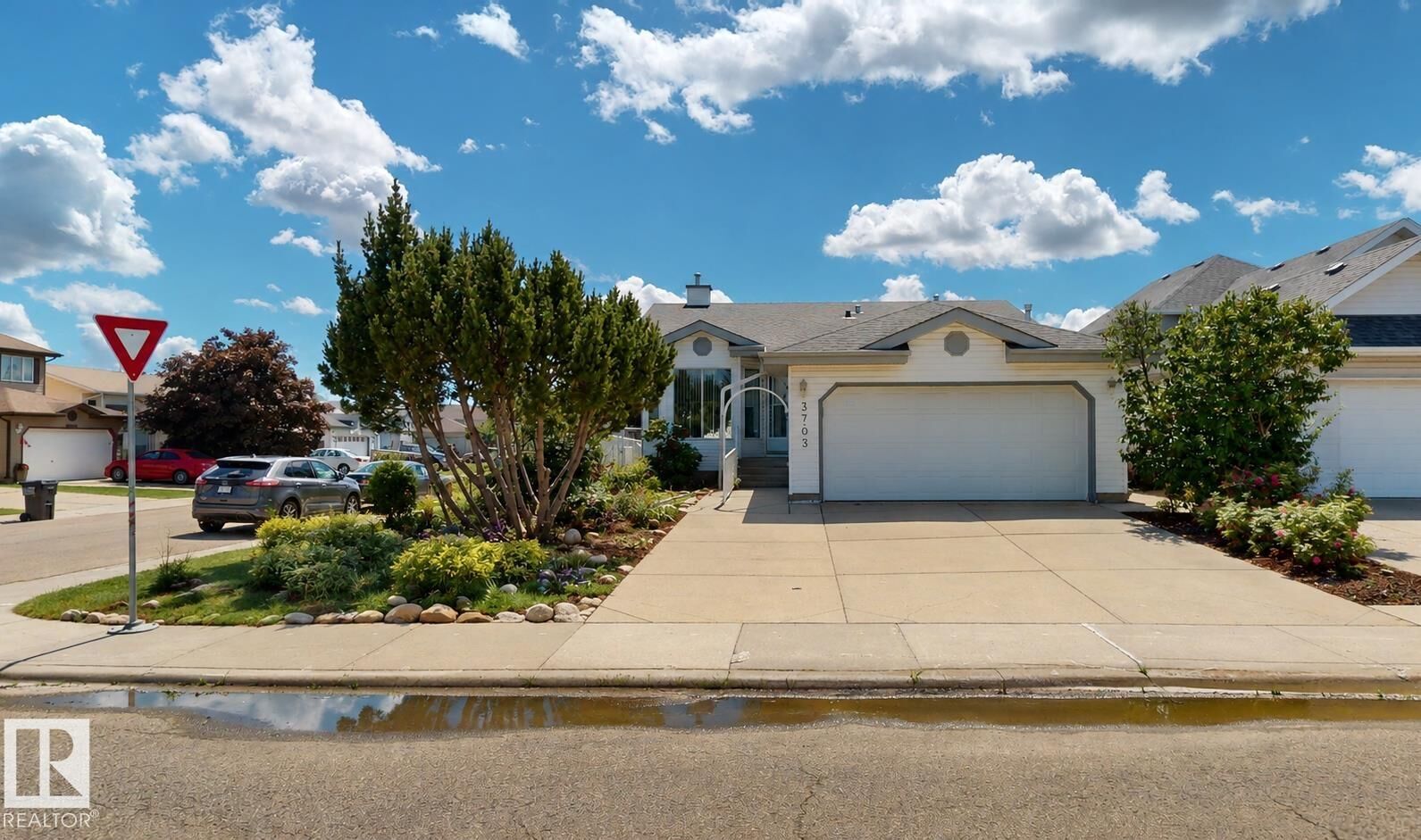 Property Photo:  3703 131 Avenue NW  AB T5A 5A4 