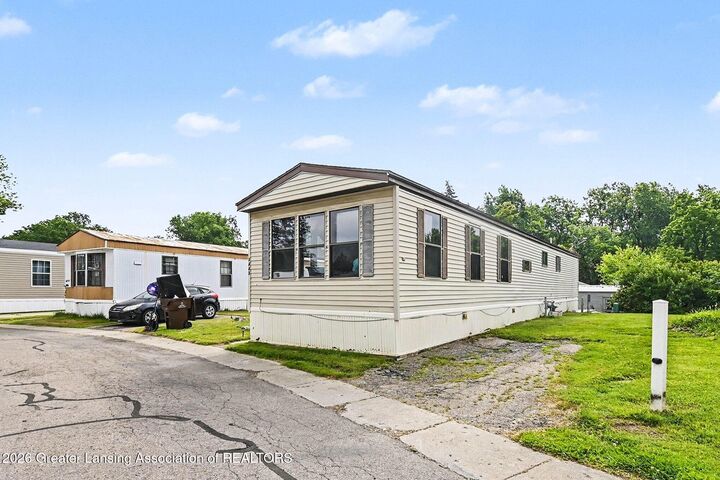 Property Photo:  3443 Loveside Terrace  MI 48917 