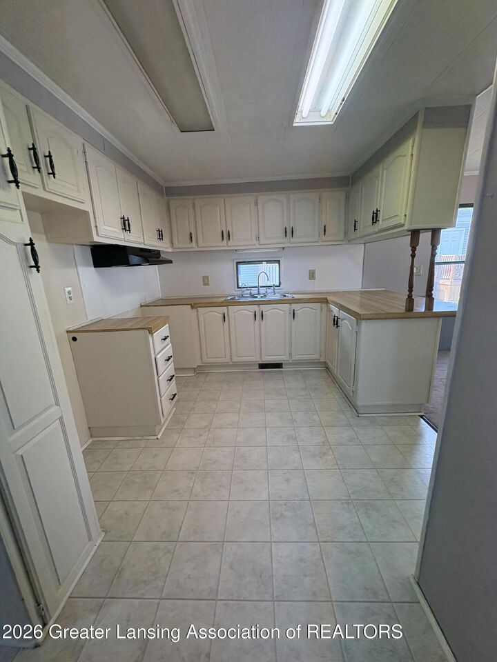 Property Photo:  3443 Loveside Terrace  MI 48917 