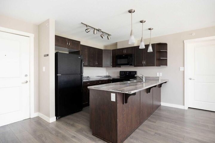 Property Photo:  115 Denholm Gate Gate 408  AB T9H 0B2 