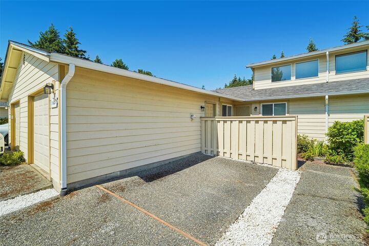 Property Photo:  24934  110th Place SE 5B  WA 98030 