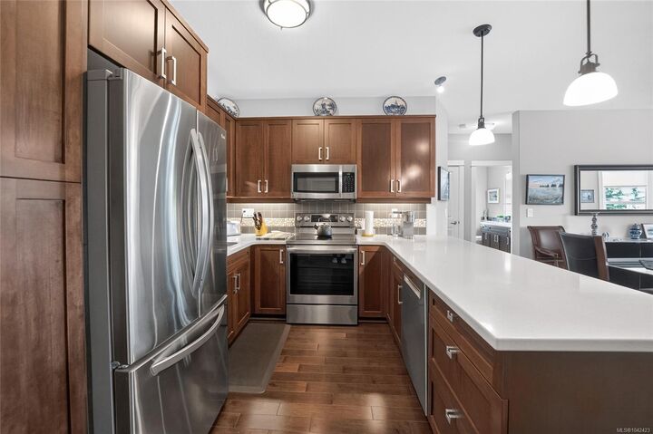 Property Photo: 6310 McRobb Ave #206 BC V9V 1W8