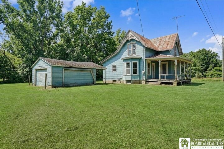 Property Photo: 6843 County Road 20 NY 14739
