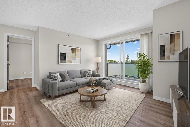 Property Photo:  13907 136 Street NW 405  AB T6V 1Y5 