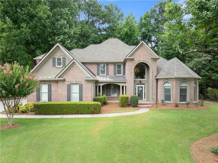 Property Photo: 7250 Scotshire Way GA 30040