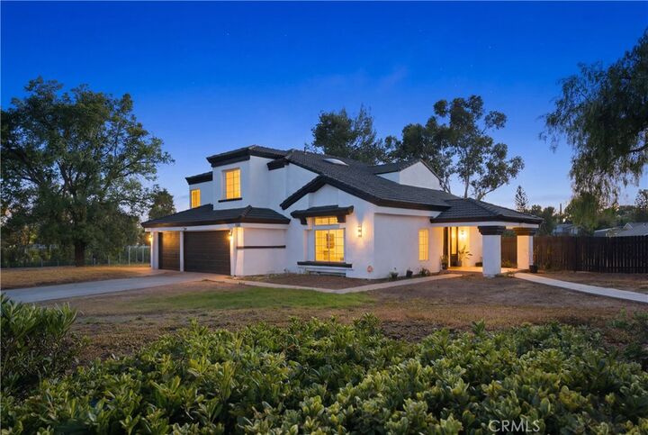 Property Photo:  11901 Vista De Cerros  CA 92555 