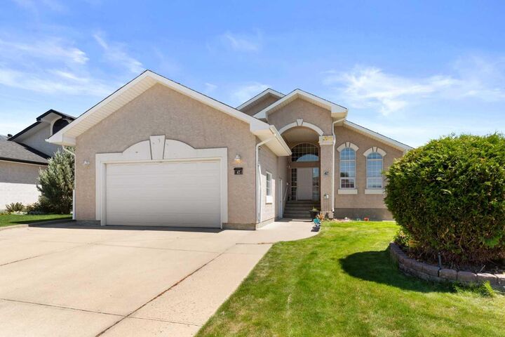 Property Photo: 47 Taylor Avenue SE AB T1B 4B7