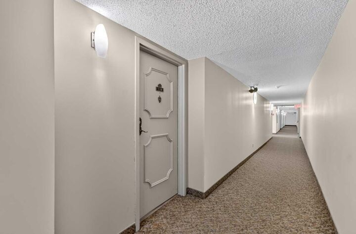 Property Photo: 2425 90 Avenue SW 118 AB T2V 4X8
