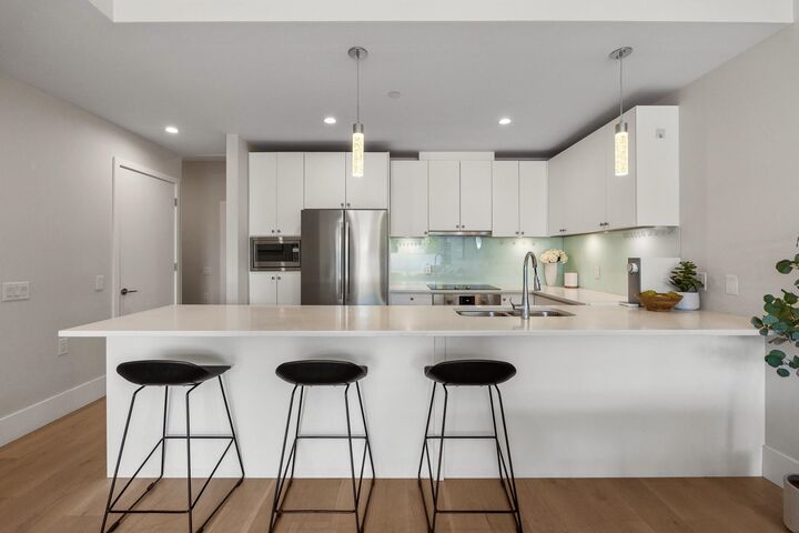 Property Photo: 1591 Bowser Avenue 206 BC V7P 2Y4
