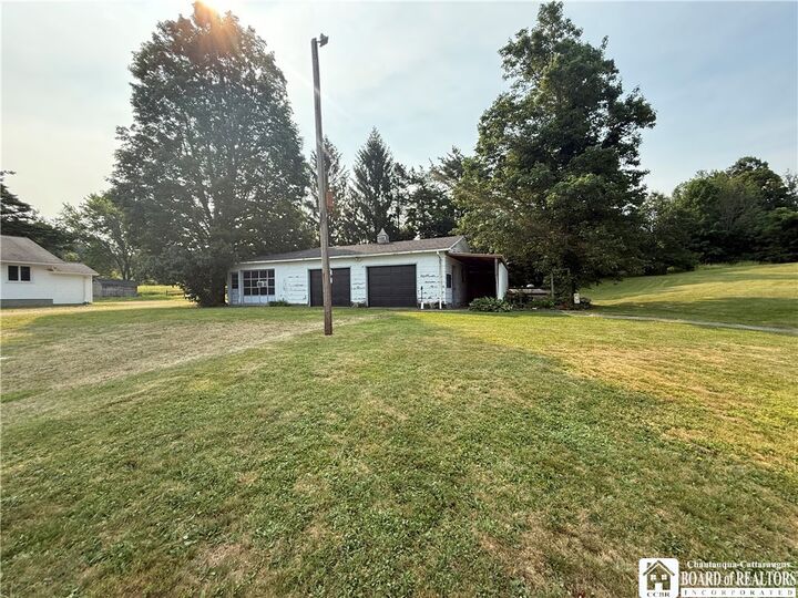 Property Photo:  10095 Route 242  NY 14755 