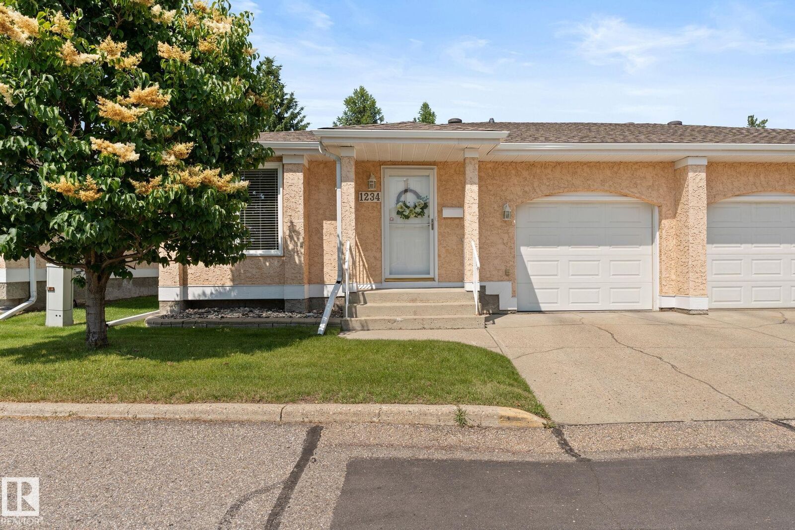 Property Photo: 1234 105 Street NW AB T6J 6J9
