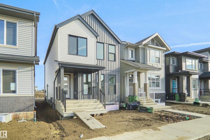 Property Photo:  21035 25 Avenue NW  AB T5Y 4G2 