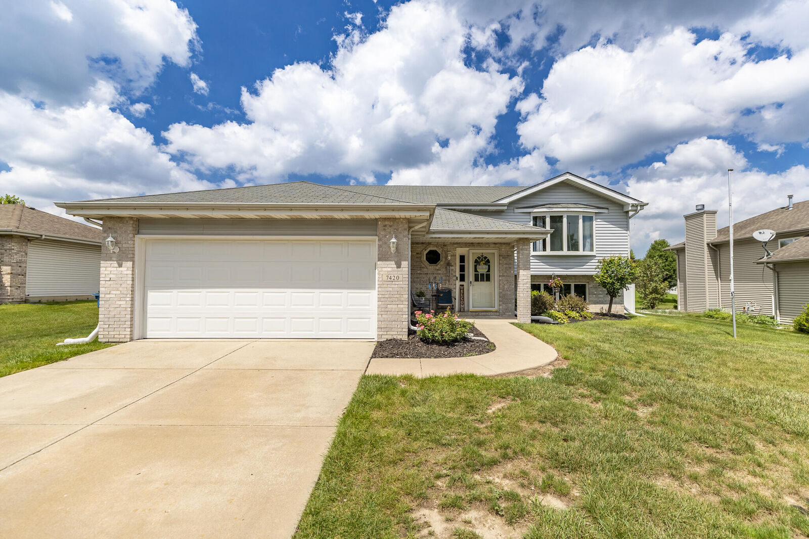 Property Photo:  7420 W 92nd Avenue  IN 46307 