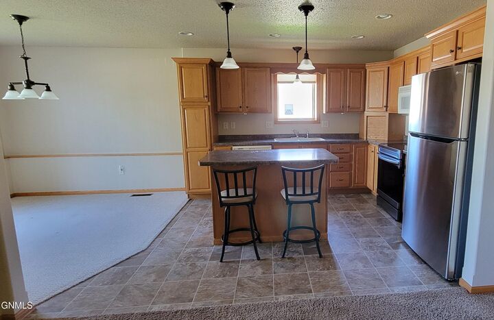 Property Photo:  961 Santa Fe Avenue 1  ND 58504 