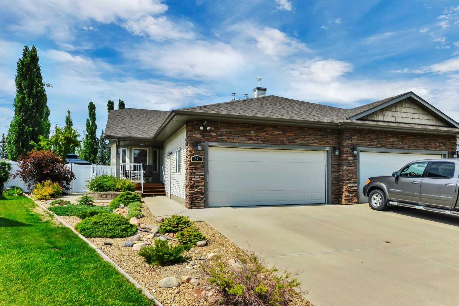 Property Photo:  47 Victor Close  AB T4R 0E5 