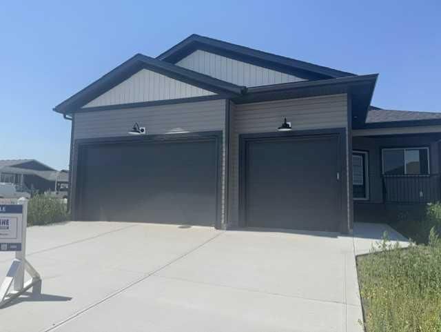 Property Photo:  32 Sunrise Crescent N  AB T0M 2A0 