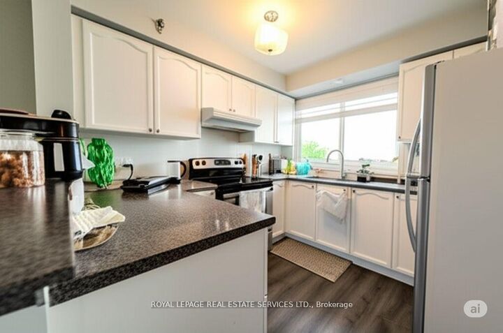 Property Photo: 4450 Fairview Street 406 ON L7L 7K7